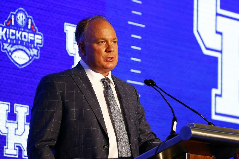 Kentucky head coach Mark Stoops speaks to reporters during the NCAA college football Southeastern Conference Media Days, Thursday, July 18, 2019, in Hoover, Ala. 