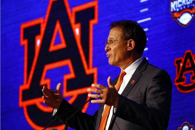 The Associated Press UNDER PRESSURE: Auburn head coach Gus Malzahn speaks to reporters Thursday during the NCAA Southeastern Conference Media Days.