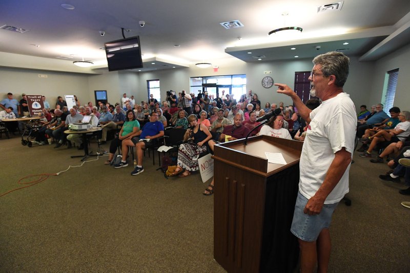 NWA Democrat-Gazette/J.T. WAMPLER Jeff Hottinger of Lowell makes an impassioned plea Thursdaay against having a new quarry in his neighborhood during a town hall in Lowell. More than 100 people attended the meeting called to discuss plans for Old Wire Road.
