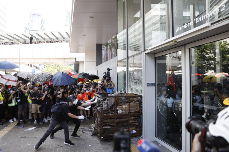 Demonstrators break into the Legislative Council building during a protest on July 1, 2019. MUST CREDIT: Bloomberg photo by Justin Chin
