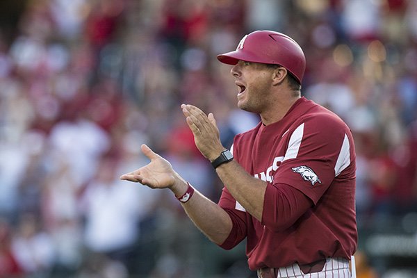 Arkansas assistant coach Nate Thompson encourages players during a game against Tennessee on Saturday, April 27, 2019, in Fayetteville.