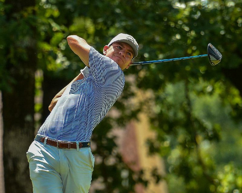 AJ Ott of Fort Collins, Colo., tees off on the 18th hole during Saturday’s final round of the Southern Amateur Championship at Chenal Country Club in Little Rock. Ott defeated Noah Woolsey on the second extra hole to win the tournament. 