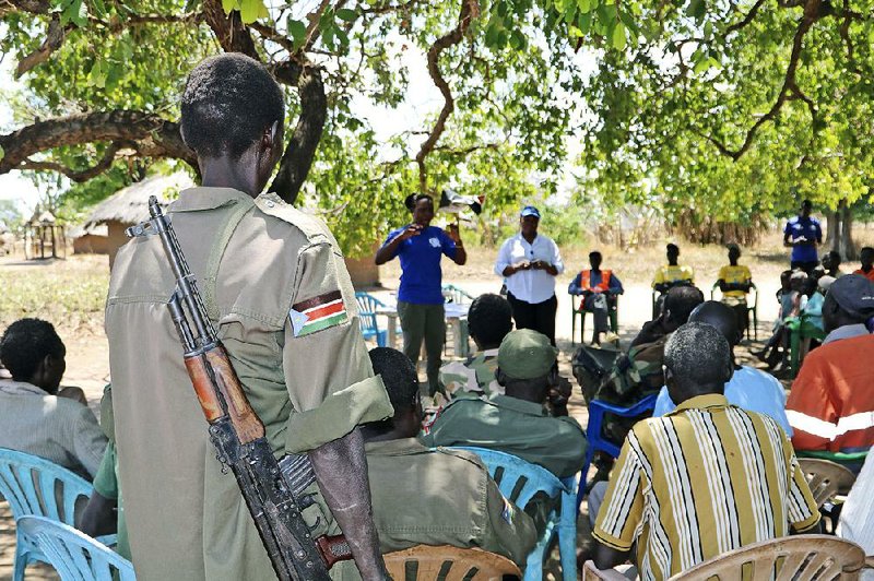 Health workers near Yei, South Sudan, conduct a training presentation in February teaching people how to detect and prevent the spread of Ebola. One case of Ebola has been detected near the South Sudan’s border with Congo. story.lead_photo.caption