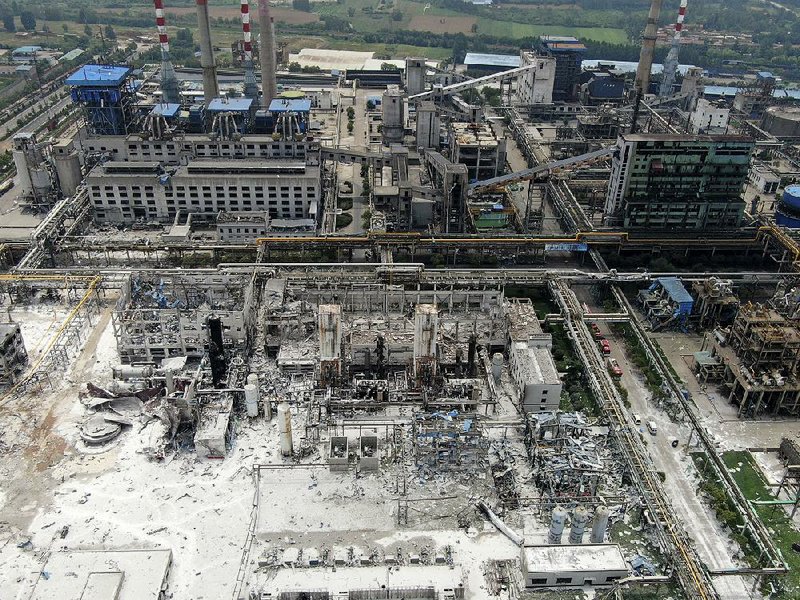 A view from the air Saturday shows the extent of damage to a gas plant in Yima city in central China’s Henan province. 