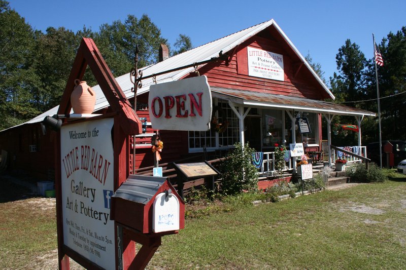 The Little Red Barn Pottery and Art Gallery is a treasure trove of South Carolina-made pottery, including the highly-sought face jugs, as well as handwoven shawls, quilts, and other collectibles. (Photo by Mary Ann Anderson via TNS)