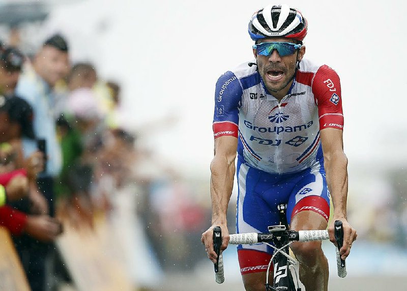 France’s Thibaut Pinot crosses the finish line in second place during the 15th stage of the Tour de France on Sunday in Prat d’Albis, France. Pinot moved to fourth place overall.