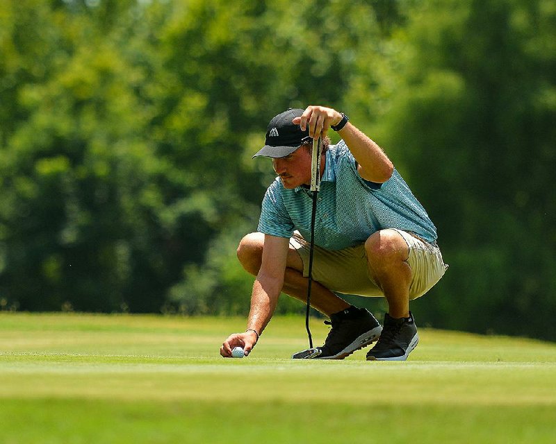 FILE — Spencer Labarbera lines up a putt during the final round at the Maumelle Classic at Maumelle Country Club in this July 21, 2019 file photo. 
