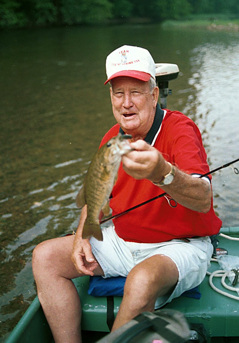 NWA Democrat-Gazette/FLIP PUTTHOFF 
The late J.D. Fletcher on the Kings River in 2002. Fletcher had a knack for catching summertime smallmouth bass with buzz baits.