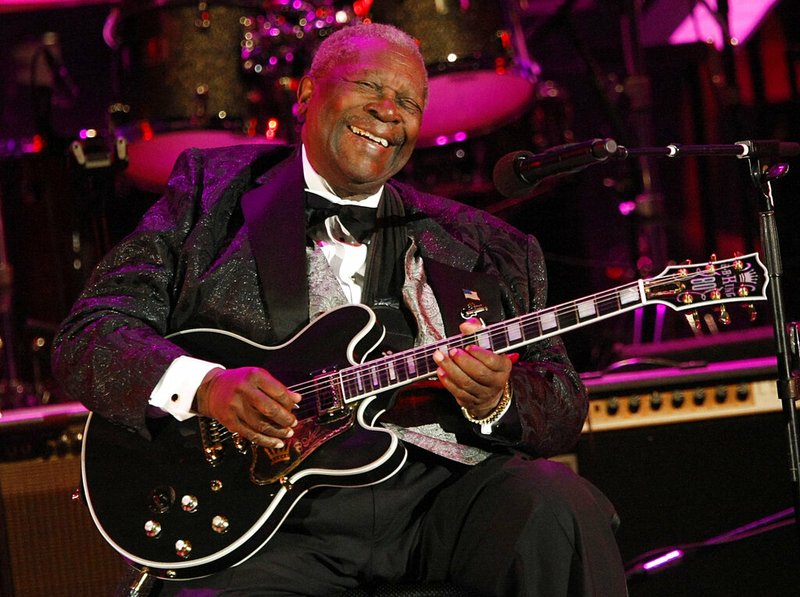 In this June 20, 2008 file photo, musician B.B. King performs at the opening night of the 87th season of the Hollywood Bowl in Los Angeles. Julien's Auctions announced Tuesday, July 23, 2019, that King's black Gibson ES-345 prototype guitar is among the items from his estate that will go up for bid on Sept. 21. Julien's says Gibson gave King the instrument for his 80th birthday. (AP Photo/Dan Steinberg, File)