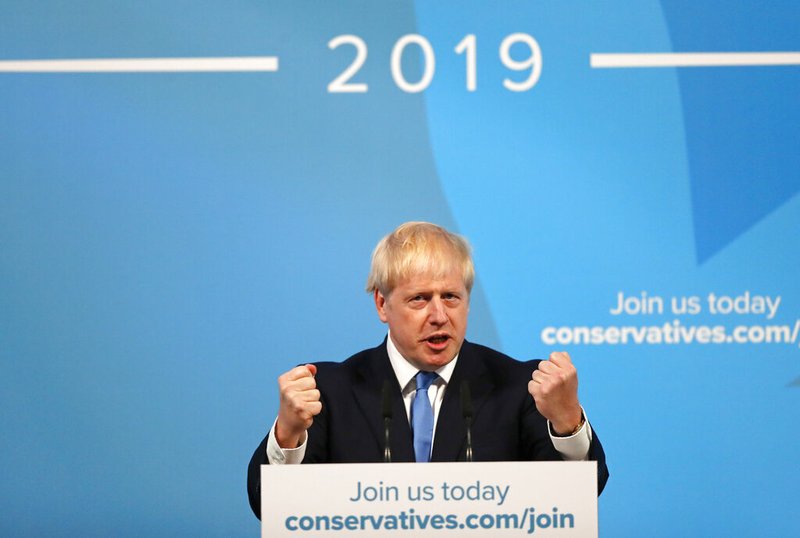 Boris Johnson gestures as he speaks after being announced as the new leader of the Conservative Party in London, Tuesday, July 23, 2019. Brexit champion Boris Johnson won the contest to lead Britain's governing Conservative Party on Tuesday, and will become the country's next prime minister. (AP Photo/Frank Augstein)