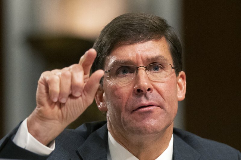 In this July 16, 2019 photo, Secretary of the Army and Secretary of Defense nominee Mark Esper testifies before a Senate Armed Services Committee confirmation hearing on Capitol Hill in Washington. Esper, an Army veteran and former defense industry lobbyist, won Senate confirmation Tuesday to be the Secretary of Defense. (AP Photo/Manuel Balce Ceneta)
