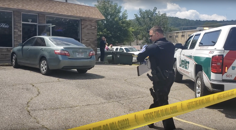 The Sentinel-Record/Grace Brown
Hot Springs police work the scene of a reported fatal shooting at Third and Rector Wednesday afternoon.