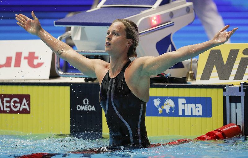 Italy’s Federica Pellegrini celebrates after winning the women’s  200-meter freestyle Wednesday at the world swimming championships in Gwangju, South Korea. 