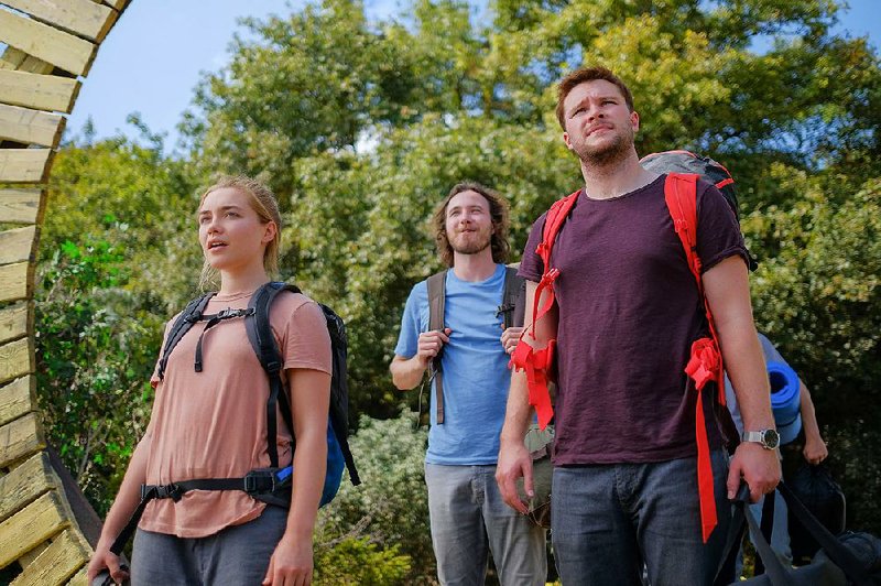 Dani (Florence Pugh) and Christian (Jack Reynor) pay a visit to their friend Pelle’s (Vilhelm Blomgren, rear) home turf in Ari Aster’s “break-up movie” Midsommar.