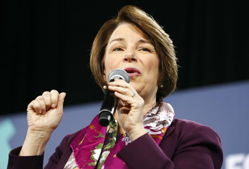 In this April 27, 2019, file photo, Democratic presidential candidate Sen. Amy Klobuchar, D-Minn., right, speaks at a Service Employees International Union forum on labor issues in Las Vegas.
