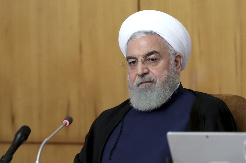 In this photo released by the office of the Iranian Presidency, President Hassan Rouhani speaks in a cabinet meeting in Tehran, Iran, Wednesday, July 24, 2019. President Hassan Rouhani suggested on Wednesday that Iran might release a U.K.-flagged ship if Britain takes similar steps to release an Iranian oil tanker seized by the British Royal Navy off Gibraltar earlier this month. (Iranian Presidency Office via AP)

