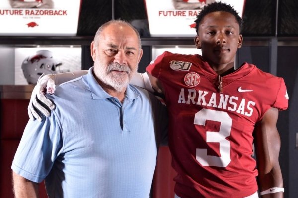 Arkansas defensive coordinator John Chavis and Aaron Moore