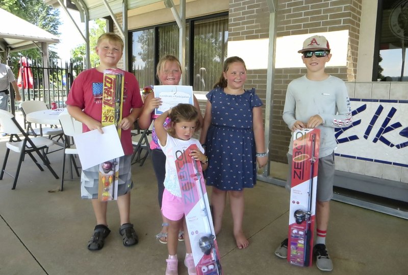 Courtesy photo The Fayetteville-Springdale Elks Lodge hosted a youth fishing tournament in the pond behind the lodge recently. Prizes were awarded for the biggest, the smallest and the most fish caught in different age categories. Hamburgers and hot dogs were served with about 22 children attended. Winners were Matthew Wildman (from left), Haisley Hawley, Haddie Hawley, Blake Rogers and Keira Kloepfer (front).