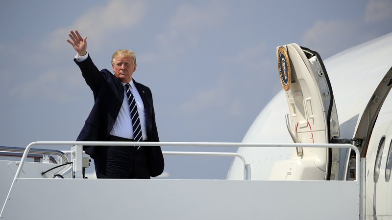 President Donald Trump waves as he boards Air Force One at Andrews Air Force Base, Md., Friday, July 19, 2019. (AP Photo/Manuel Balce Ceneta)

