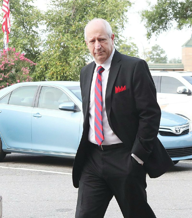 Rep. Mickey Gates, R-Hot Springs, arrives at the Garland County Courthouse on Monday. The three-term state legislator pleaded no contest to failing to pay income taxes, avoiding a felony trial.