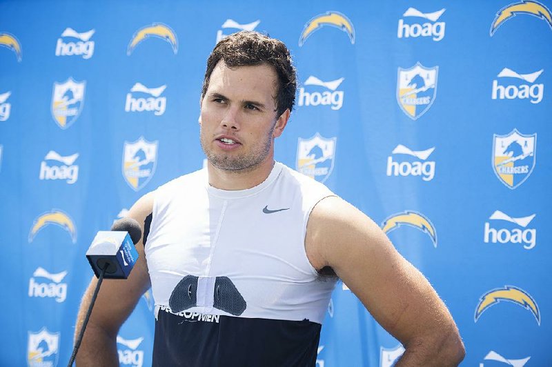 Los Angeles Chargers tight end Hunter Henry talks to the media after practice during an NFL football training camp in Costa Mesa, Calif., Monday, July 29, 2019. 