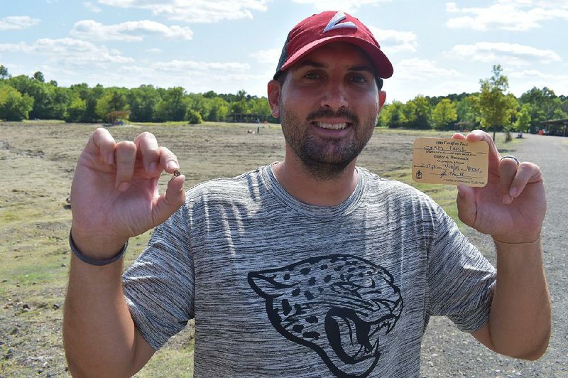 Josh Lanik, a teacher from Hebron, Neb., shows the 2.12-carat diamond that he found during a recent visit to Crater of Diamonds State Park in Murfreesboro. 