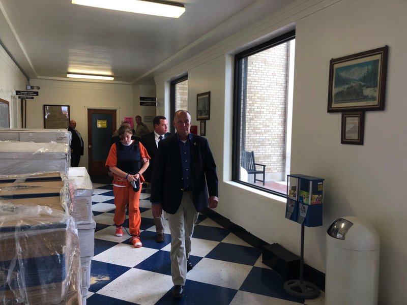 FILE — Rebecca O'Donnell is escorted through the Randolph County courthouse after a hearing on July 30.