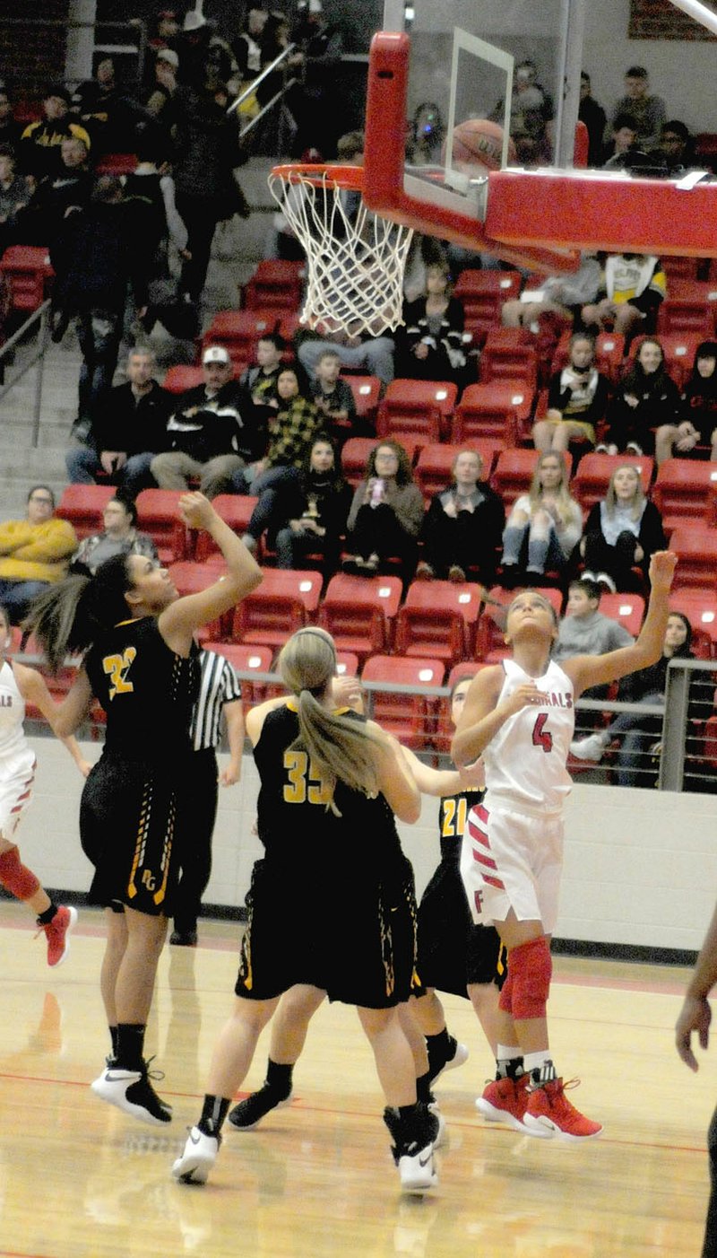 MARK HUMPHREY ENTERPRISE-LEADER Farmington's Madisyn Pense scored the first basket of the game as the Lady Cardinals opened 4A-1 Conference play against Prairie Grove with a 58-29 victory at Cardinal Arena. Pense scored 1,210 points in a Lady Cardinal uniform joining teammate, Makenna Vanzant, as dual 1,000-point career scorers.