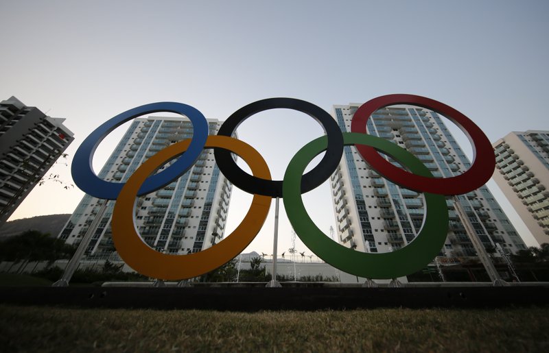 In this July 23, 2016, file photo, a representation of the Olympic rings are displayed in the Olympic Village in Rio de Janeiro, Brazil. A bill spurred by Larry Nassar's sex crimes and other mishandled abuse cases would allow Congress to fire the U.S. Olympic and Paralympic Committee's entire board and would quadruple the money the federation provides to the U.S. Center for SafeSport. (AP Photo/Leo Correa, File)