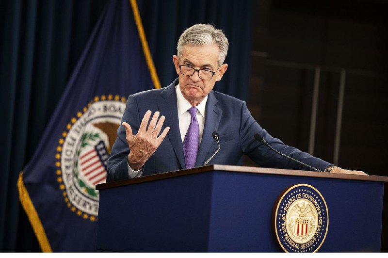 In announcing the rate cut Wednesday in Washington, Federal Reserve Chairman Jerome Powell characterized the U.S. economy as “positive” and said “downside risks” are to be found overseas. 