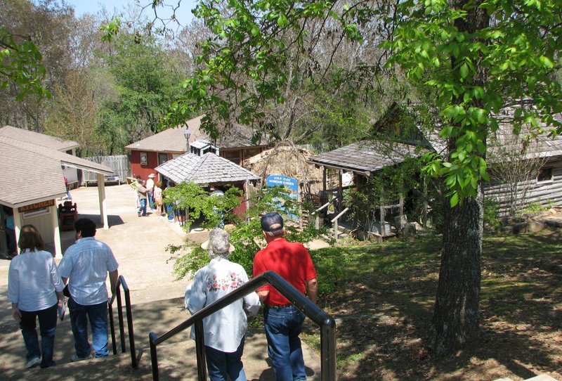 Visitors explore the Ozark Folk Center craft village in this file photo.