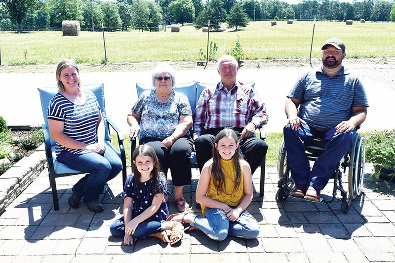 The Jerry Duvall family of Hattieville is the 2019 Conway County Farm Family of the Year; they have also been named the Western District Farm Family of the Year. Family members include, front row, from left, Payton Duvall, 8, and Brooke Duvall, 12; and back row, Jayme Duvall, Kathy Duvall, Jerry Duvall and Jeremy Duvall. The Duvalls raise hay, timber, corn and soybeans, as well as cattle and poultry.