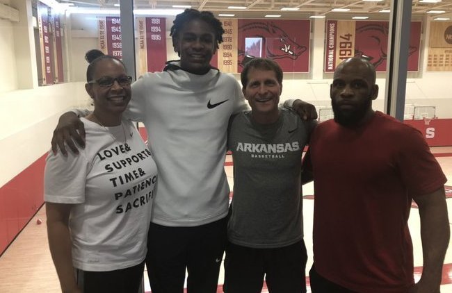 ESPN 4-star Rondel Walker and his parents pose with Coach Eric Musselman. 