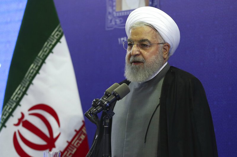 In this photo released by the official website of the office of the Iranian Presidency, President Hassan Rouhani speaks in the inauguration ceremony of a power plant in northwestern Iran, Thursday, Aug. 1, 2019. Rouhani said U.S. financial sanctions on Iran's foreign minister are "childish" and a barrier to diplomacy. (Iranian Presidency Office via AP)