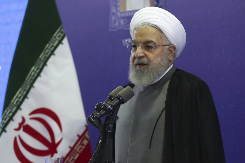 In this photo released by the official website of the office of the Iranian Presidency, President Hassan Rouhani speaks in the inauguration ceremony of a power plant in northwestern Iran, Thursday, Aug. 1, 2019. Rouhani said U.S. financial sanctions on Iran's foreign minister are &quot;childish&quot; and a barrier to diplomacy. (Iranian Presidency Office via AP)