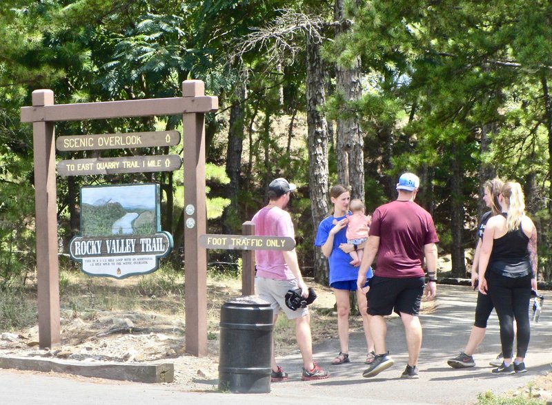 Visitors meet near the start of the Rocky Valley Trails 2-mile loop at Pinnacle Mountain State Park. (Photo by Marcia Schnedler via Democrat-Gazette)