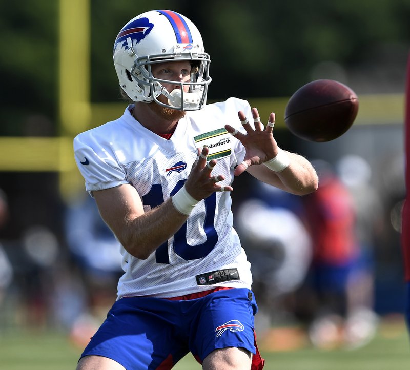 FILE - In this July 25, 2019, file photo, Buffalo Bills wide receiver Cole Beasley catches a pass during practice at the NFL football team's training camp in Pittsford, N.Y. In Buffalo, Beasley is being asked to play a central role in what had been a patchwork offense that underwent a major overhaul in free agency this offseason. (AP Photo/Adrian Kraus, File)