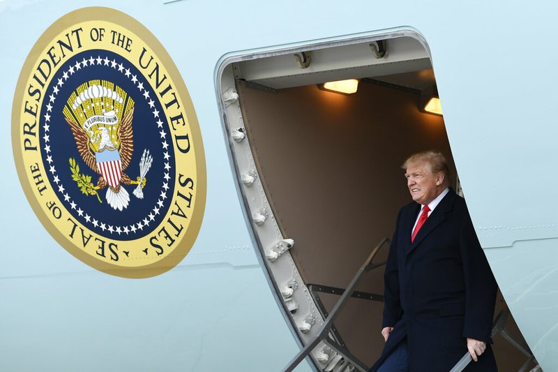 In this April 15, 2019, file photo, President Donald Trump walks down the steps of Air Force One at Andrews Air Force Base in Maryland. (AP Photo/Susan Walsh, File)