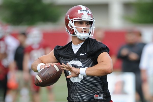Arkansas quarterback Ben Hicks looks to pass Friday, Aug. 2, 2019, during practice at the university practice field in Fayetteville. Visit nwad.com/photos to see more photographs from the practice.
