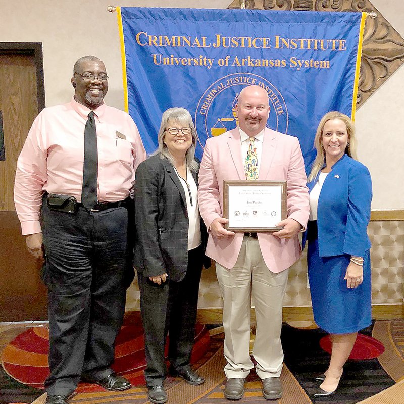 COURTESY PHOTO Jon Purifoy, second from right, principal of Farmington High School, was one of three candidates considered for the award Administrator of the Year in School Safety by the Arkansas Safe School Association.