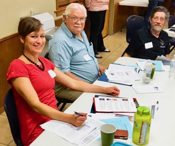 SUBMITTED Ashley Harris (left), Gravette Planning Commission chairwoman, Bill Mattler, Planning Commission vice-chairman, and Mike von Ree, Gravette city planner, smile during a break in the Planning 301 workshop they attended Wednesday, July 24, in Centerton. The workshop was hosted by the Arkansas Public Administration Consortium and the Arkansas Chapter of the American Planning Association. David Keck, Gravette building inspector and code enforcement officer (not pictured) also attended.