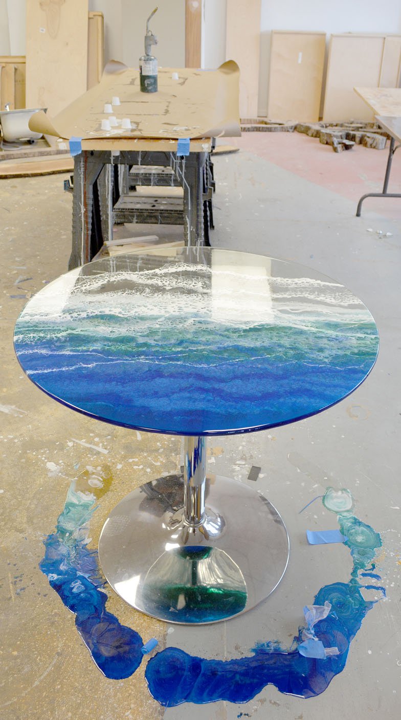 Keith Bryant/The Weekly Vista A freshly-epoxied table sits in Jim Wetherington's workshop.