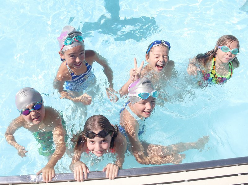 LYNN KUTTER ENTERPRISE-LEADER A few of the members of the Prairie Grove Piranhas swim team gather for a photo: Zayne Dodson, Keturah Warden, Brielle Squire, Luther Eggleston, Phoebe Eggleston. One of the children could not be identified.