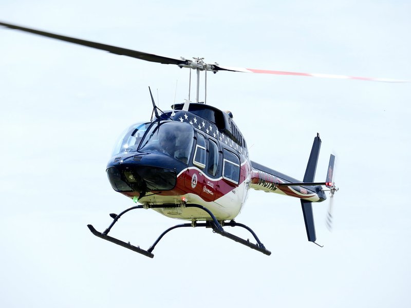 FILE — An Air Evac helicopter approaches the landing zone at Gentry Fire Station No. 2 on Aug. 1, 2019 to transport a patient brought to the station by ambulance. The landing zone is on land donated to the city by Flint Creek Power Plant. (Westside Eagle Observer/RANDY MOLL)