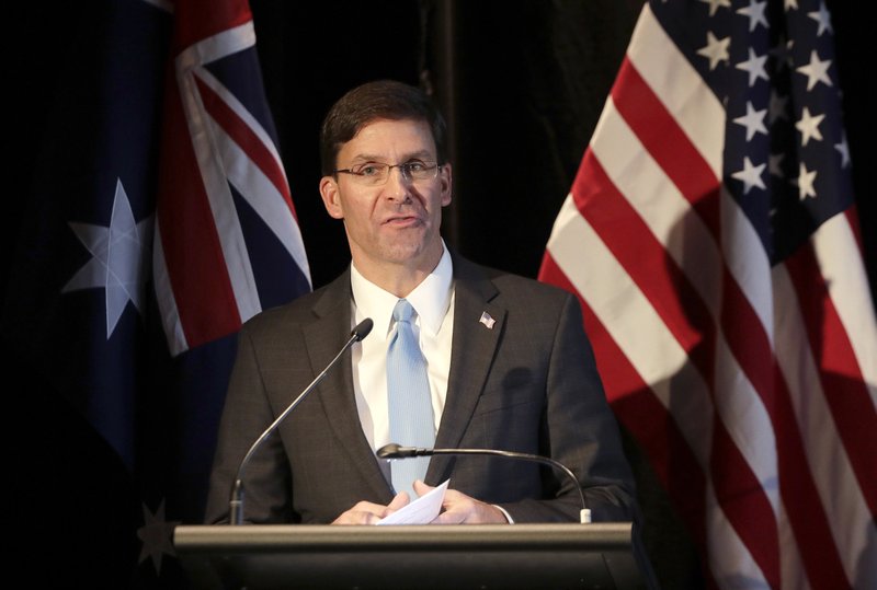 U.S. Defense Secretary Mark Esper briefs the media at a press conference following annual bilateral ministerial talks in Sydney, Australia, Sunday, Aug. 4, 2019. (AP Photo/Rick Rycroft)