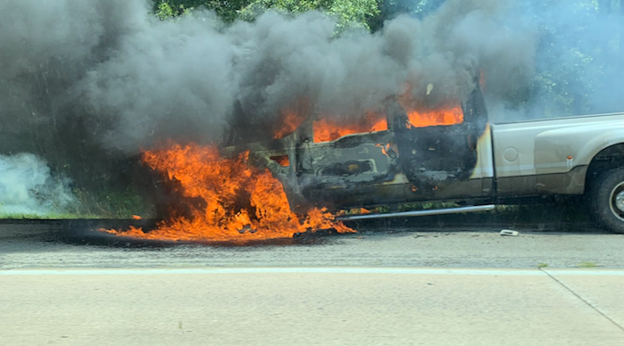 A truck burns along U.S. 167 south of Searcy on Wednesday afternoon.  The Arkansas Department of Transportation reported no injuries in the fire. 