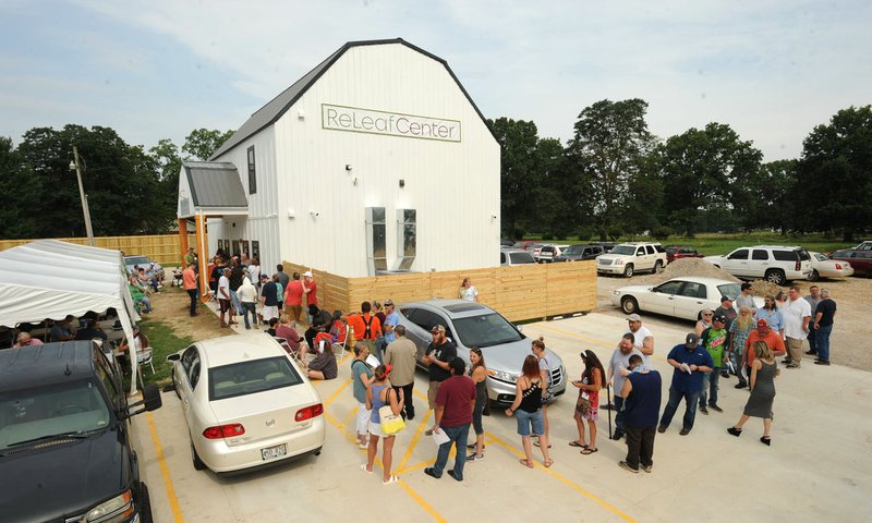 NWA Democrat-Gazette/ANDY SHUPE
A long line forms Wednesday, Aug. 7, 2019, during the first day of operations for The ReLeaf Center, a medical marijuana dispensary located at 9400 E. McNelly Rd. in Bentonville, the first of its kind in Northwest Arkansas.
