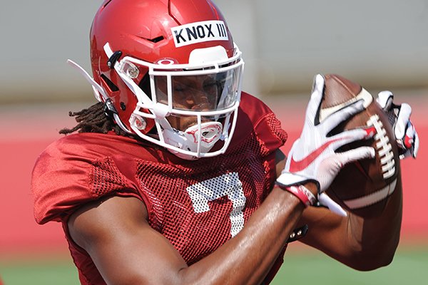 Arkansas receiver Trey Knox (7) makes a catch Tuesday, Aug. 6, 2019, during practice at the university practice field.