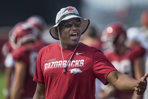 Turner Gill is shown at an Arkansas football practice on Wednesday, Aug. 7, 2019, in Fayetteville. Gill in his first season in a non-coaching role on the Razorbacks' football staff. 