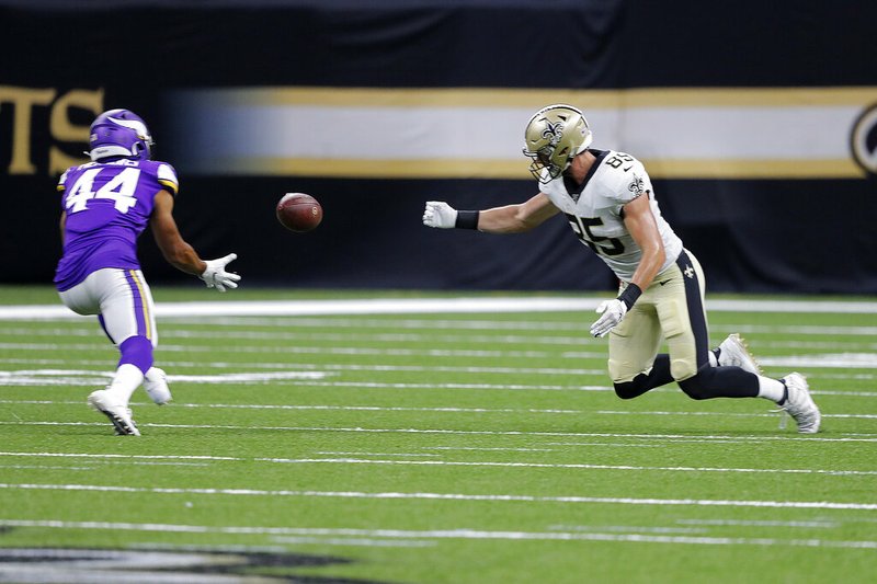 The Associated Press

PICK-SIX:

Minnesota Vikings defensive back Nathan Meadors (44) pulls in an interception for a touchdown on a bobbled pass by New Orleans Saints tight end Dan Arnold (85) in the second half of Friday's game in New Orleans.